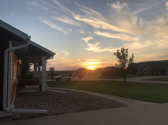 Our house sits on a hill on a cul-de-sac and overlooks the town. We have perfect views of the sunsets, and in Iowa they never disappoint. 