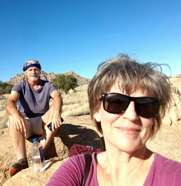 Amy's Mom and Dad on a hike. We love being outdoors, hiking, playing tennis, and going for bike rides as a family.