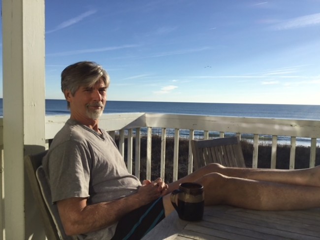 Amy's Dad enjoying some morning coffee at the beach.
