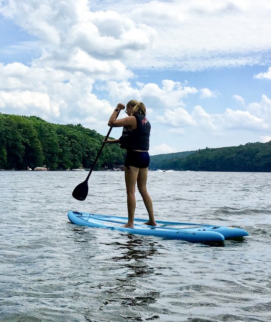 Amy Paddle boarding for the first time. She fell off pretty fast.