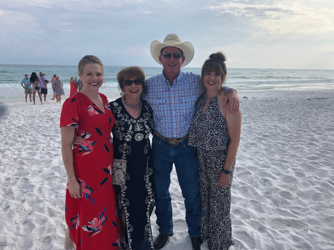 Maggie's family at a beach wedding in Florida.
