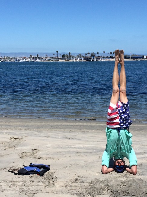 Headstand on the beach in CA