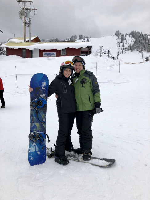 Our first attempt at snowboarding - even though we fell a lot, we had fun trying something new.