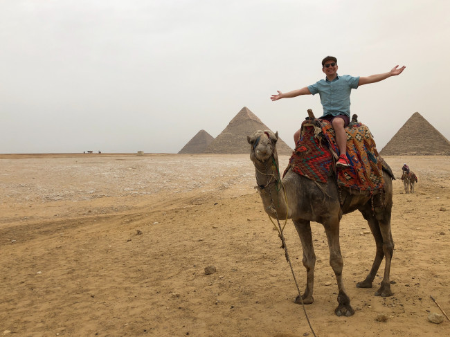 Exploring the Great Pyramids in Cairo, Egypt - complete with camel.