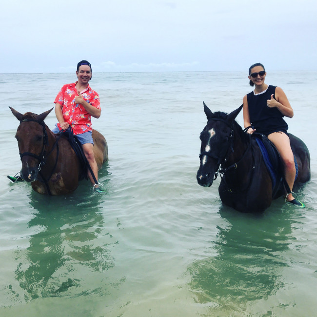 Horseback riding on the beach in Jamaica.