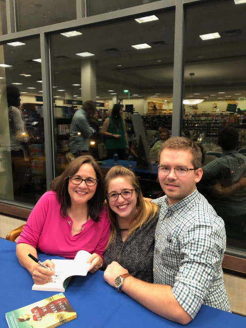 Monica and Jake with Monica's mother at her mother's first book signing for her debut Novel, 