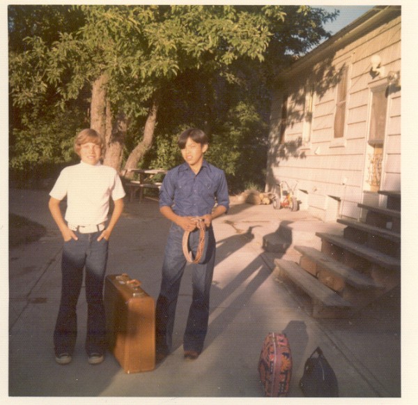 13-year-old Dennis with a friend before going home for the summer.