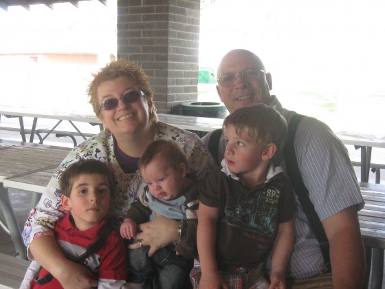 Grandma Lisa, Papa Bear, and James, Tyler, and Alex