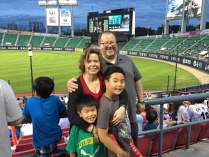 Argo/Fitton Family, Summer 2015 at a baseball game in Seoul, South Korea (from L to R, clockwise: Jonathan, Mary Joy, Peter, and Nick).