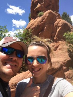 We love traveling to new places! Here is a picture of us on a vacation to Colorado. It was a beautiful place to explore!