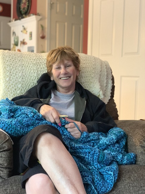 Matt’s mom crocheting . She makes the most amazing blankets, and even taught Amy!