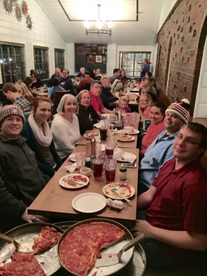 Enjoying pizza in Chicago with Jennifer’s family