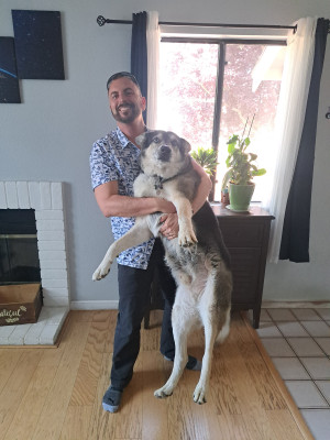 Darrell makes our house a home with his hard work, garden magic, and adventures with our (not so!) little cuddly dog, Cypher.