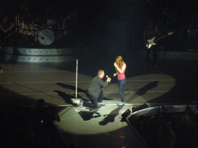 Proposing to Courtney on stage at a Rascal Flatts concert.  She said yes!  