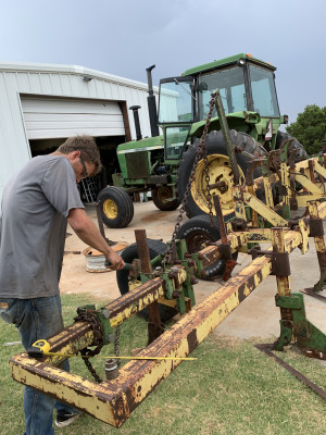 B getting things ready to plant cotton for the season. He is such a handy man and can fix anything from a tractor to a car! 