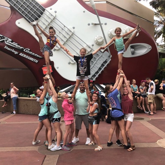 Ozzie with his cheer kids at Disney