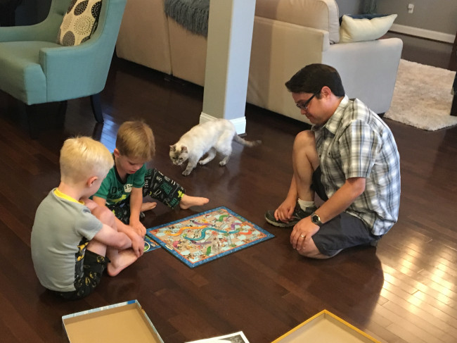 Clay's nephews (with the help of their kitty) teach him one of their favorite board games.