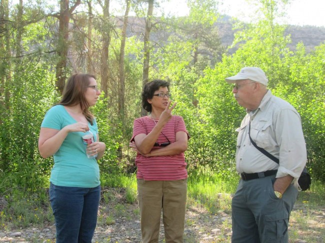 Laura, her aunt , and her uncle share deep thoughts in the woods.