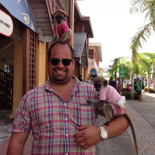 This is me in St. Croix, silly, having fun with a little monkey on my head. 