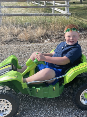 Tanner can talk anyone into letting him do stuff or get stuff.  We're always a little nervous of what he will say to anyone!  Most are happy to let him enjoy their stuff!  Vroom!  Vroom!