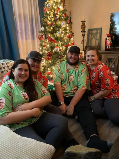 Hunter, Melissa, Hunter's sister, and her husband. We take a Christmas picture every year in our pajamas on Christmas Eve. 