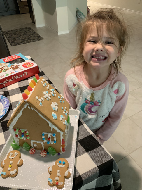 Every year we make a gingerbread house with the kids. 