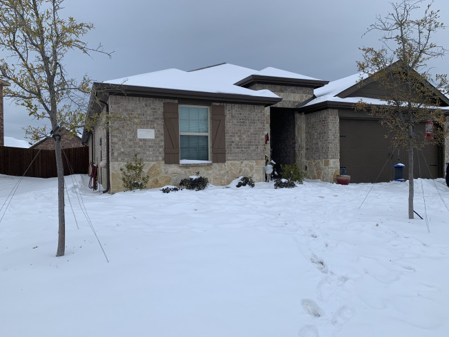 Our home during snow week in Texas.