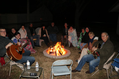 Singing around the campfire with family and friends