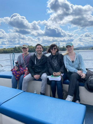 The September Honors retreat in the mountains on the lake with our students and colleagues. Here we are on the boat. It is a little cold out.