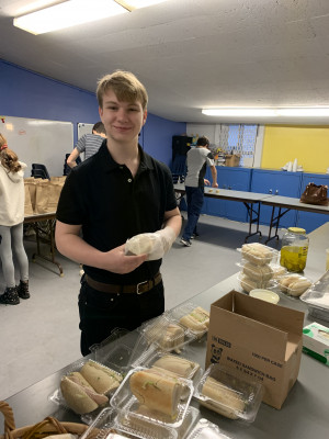 Giving back to his community is important to Manny, so he volunteers at the local food shelter to prepare and pack lunches for senior citizens.
