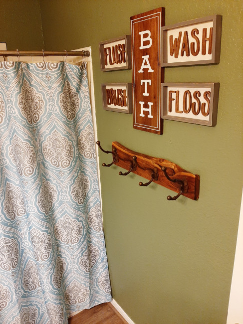 Kids/guest bathroom. Jarrett found the towel hook, and Laurice designed the room around it. 