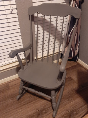 This is an old family rocker that we repainted for a one day family playroom. At the moment, it stays in Jarrett’s office where  Laurice can sit while in there. 