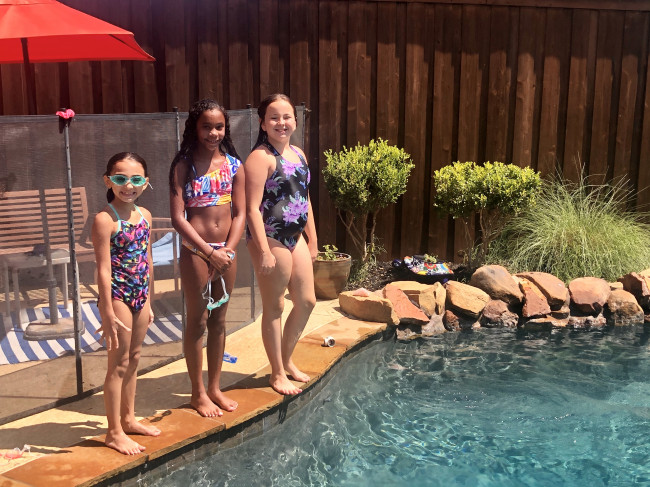 Friends over to our house to swim (all summer)