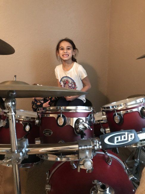 Nanny is a drummer, so she teaches the kids how to play at her house. 