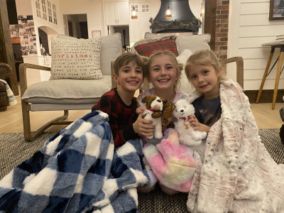 All the kids with their new Christmas Eve pajamas and blankets! 
