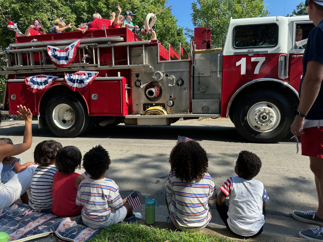 The 4th of July Parade in our neighborhood is SO much fun! It was blazing hot (Texas) but we all had a blast. The firetruck had the boys mesmerized! So cool!