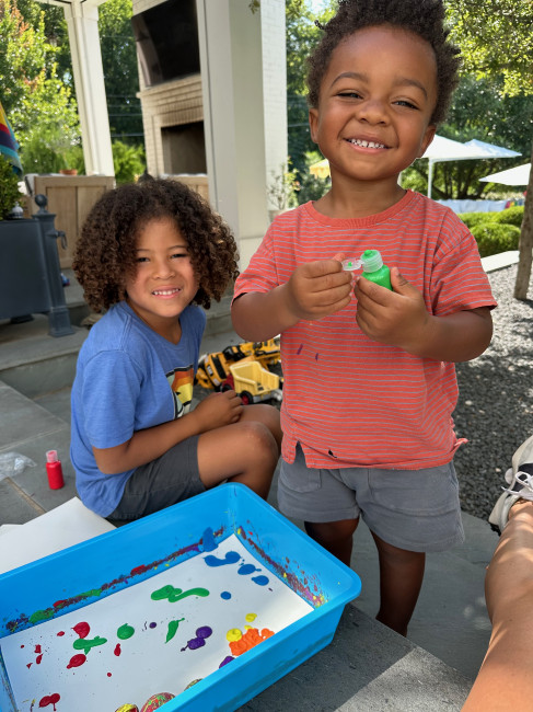 We love doing art projects together. We have a room dedicated to art & creativity in our house, but we take the messier projects to the backyard!