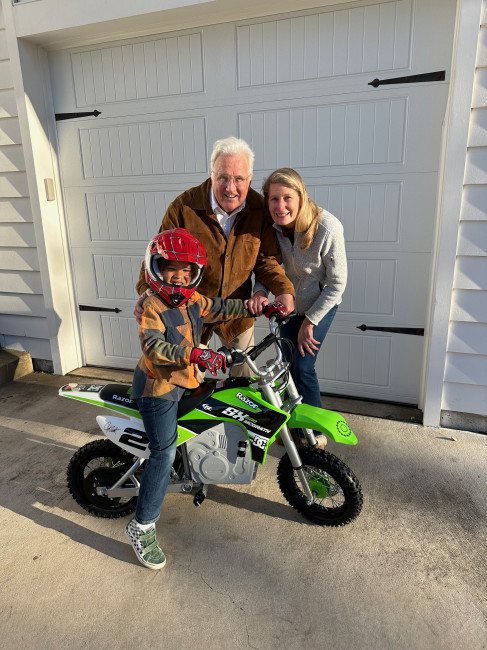 But the REAL score came from Grandma & Papa who gave Miles a MOTORCYCLE!!! He is PUMPED!