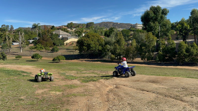 Papa's friend in San Diego lets the boys borrow his toys when we come to visit! In this pic Miles (5) is on the motorcycle and Wes (2) is driving the go-kart. They're obsessed! 