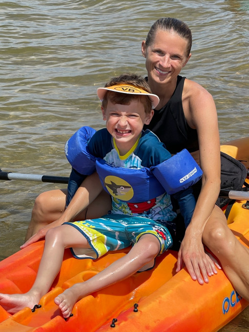 Steph sharing her love of kayaking with her nephew Tommy.  