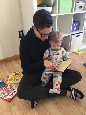 Stephen reading to our niece over a long holiday with the family.