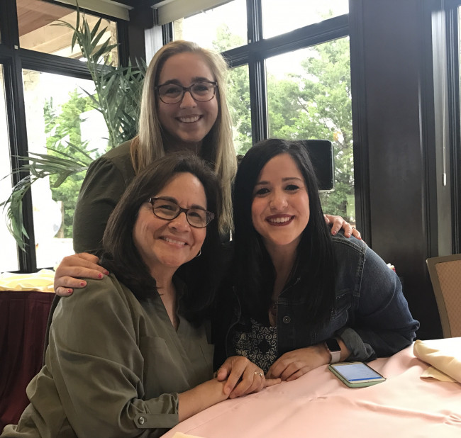 Monica with her Mom and her sister at an Easter Brunch, a fun family tradition! 