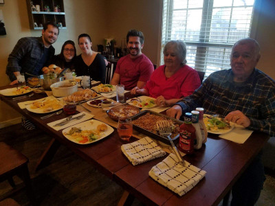 Jake and Monica with Jake's grandparents, brother and his brother's significant other at their house for Thanksgiving 