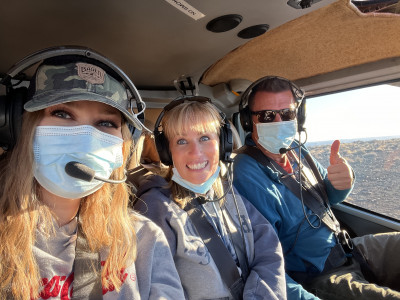 Working in the tourism industry has its perks! Jessica works with her mom and dad and enjoys work excursions with her favorite co-workers. This past year they took a helicopter tour to Tower Butte.