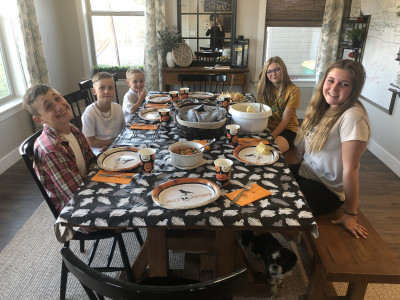 Anytime a holiday is coming up the kids will start asking when the decorations are coming out. We love celebrating the holidays and decorating the home to match the season. This is a picture of our Halloween dinner.
