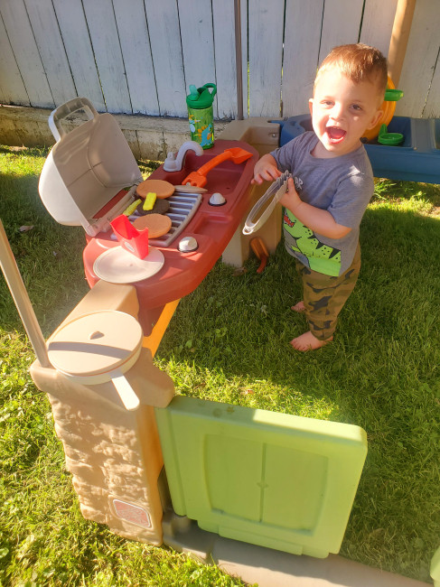 Caleb loves grilling outside 