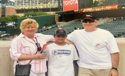 My parents and my nephew Omar at an Orioles Baseball game.  