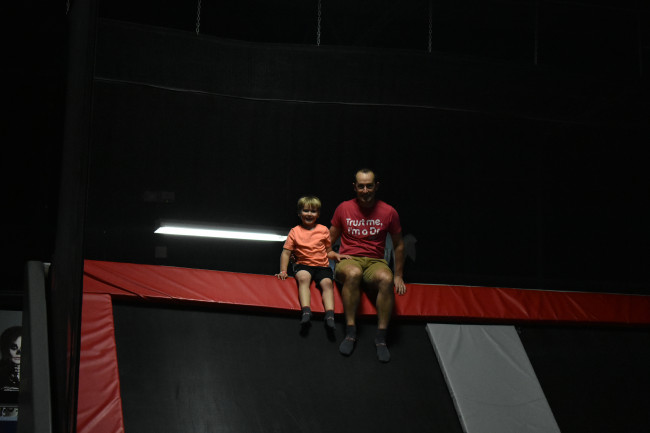 Lee with his nephew at a jump park.