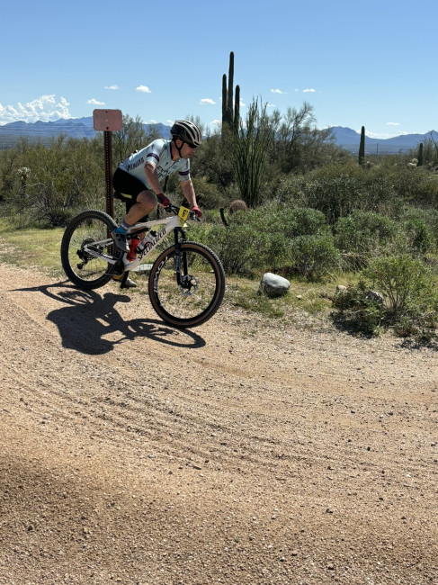 Lee racing a bike race.