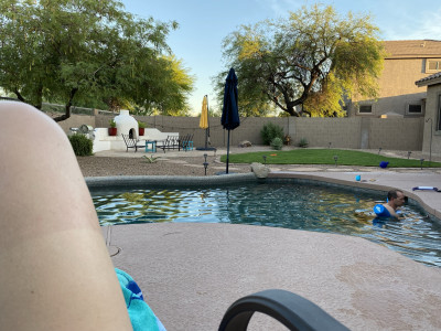 We love hanging out by our pool. You can see Elizabeth's tan lines from mountain biking.